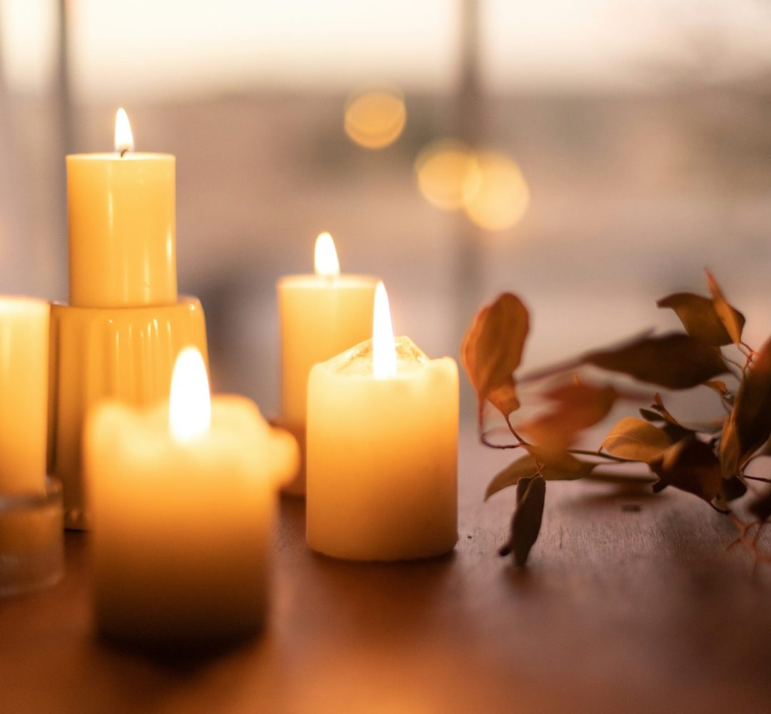 a group of candles on a table